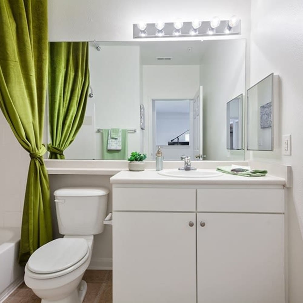 Bathroom with white finishes at Avemore Apartment Homes, Charlottesville, Virginia