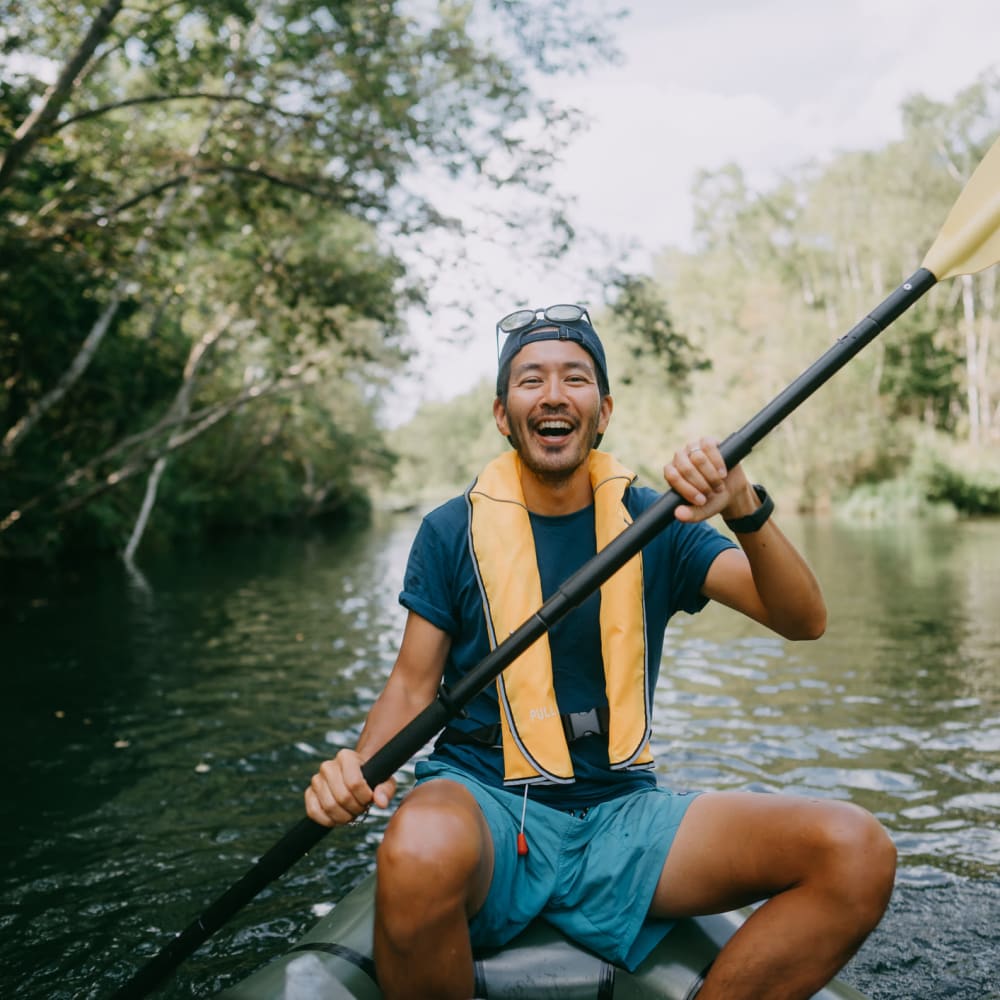 Man kayaking at Salty Dog Kayak Rentals near The Columns at Bear Creek in New Port Richey, Florida