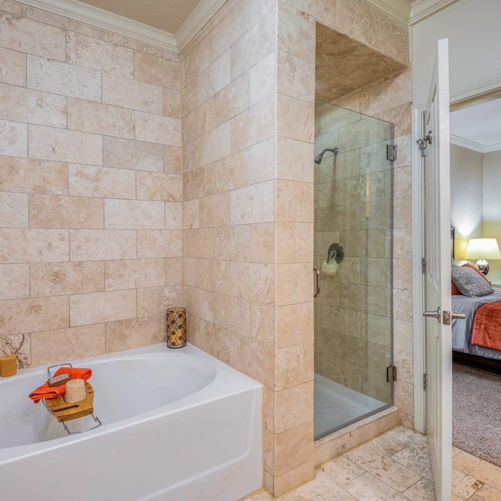 Bathroom and shower in Portico at West 8 Apartments in Houston, Texas