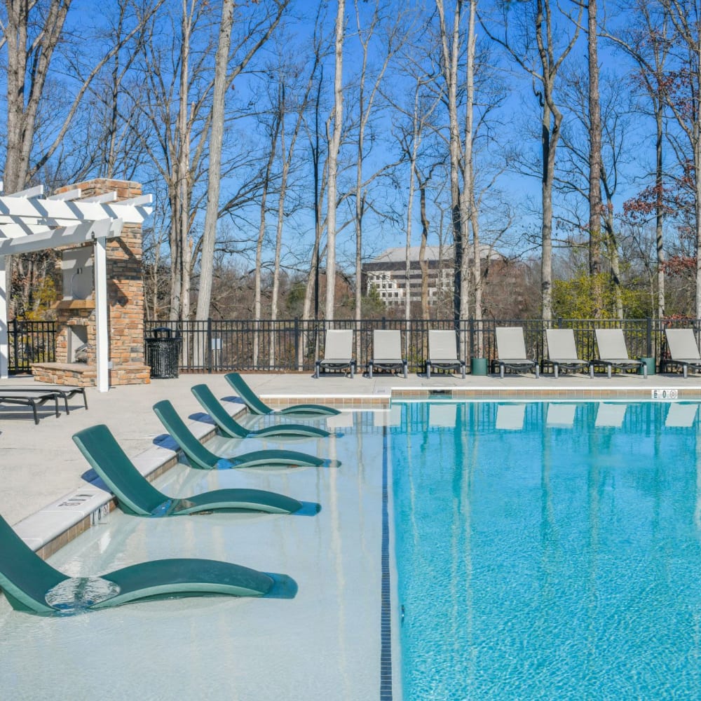 Modern pool lounge chairs at Boulders Lakeview in North Chesterfield, Virginia