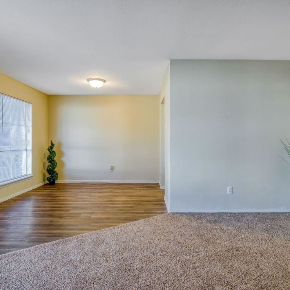 Empty floor plan living room at Villas del Tesoro in Dallas, Texas