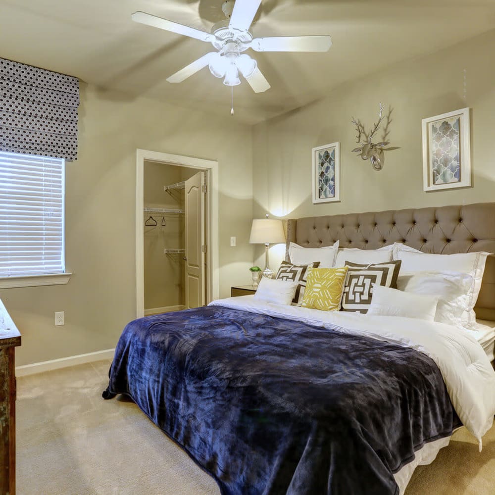 Bedroom with ceiling fan at Deerfield at Providence in Mt. Juliet, Tennessee