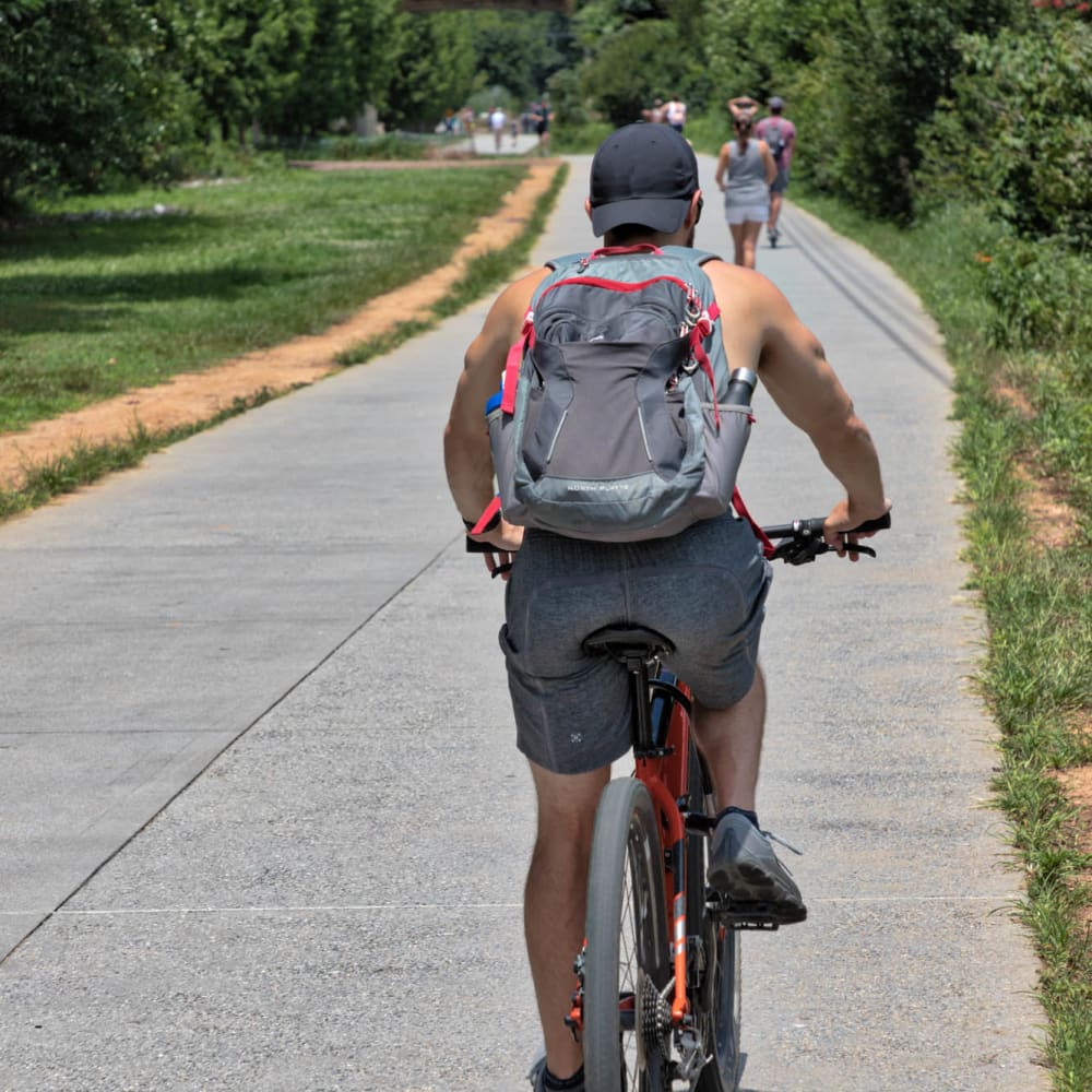 Resident riding his bike near at The Vivian in Atlanta, Georgia