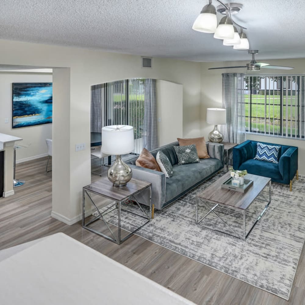 Living room with sliding door glass at The Enclave at Delray Beach in Delray Beach, Florida