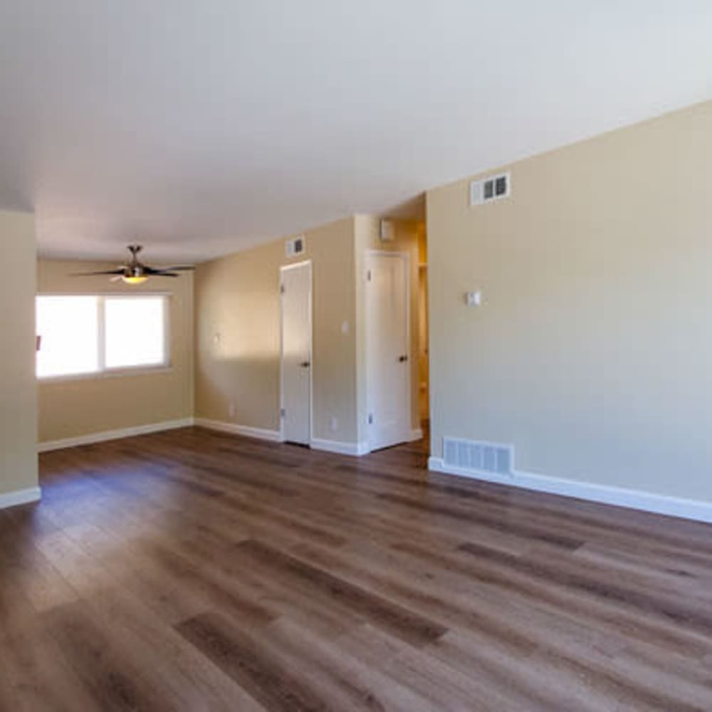 Interior apartment home with wood-style flooring and two-tone paint at our Heights at 109 community at Mission Rock at Novato in Novato, California