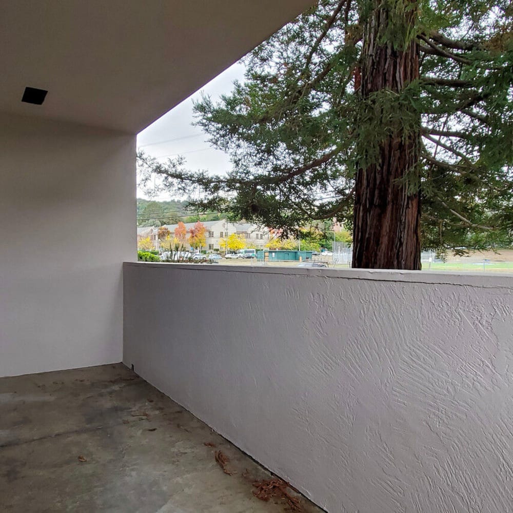 Private balcony with a view of the community outside an apartment home at Mission Rock at Novato in Novato, California