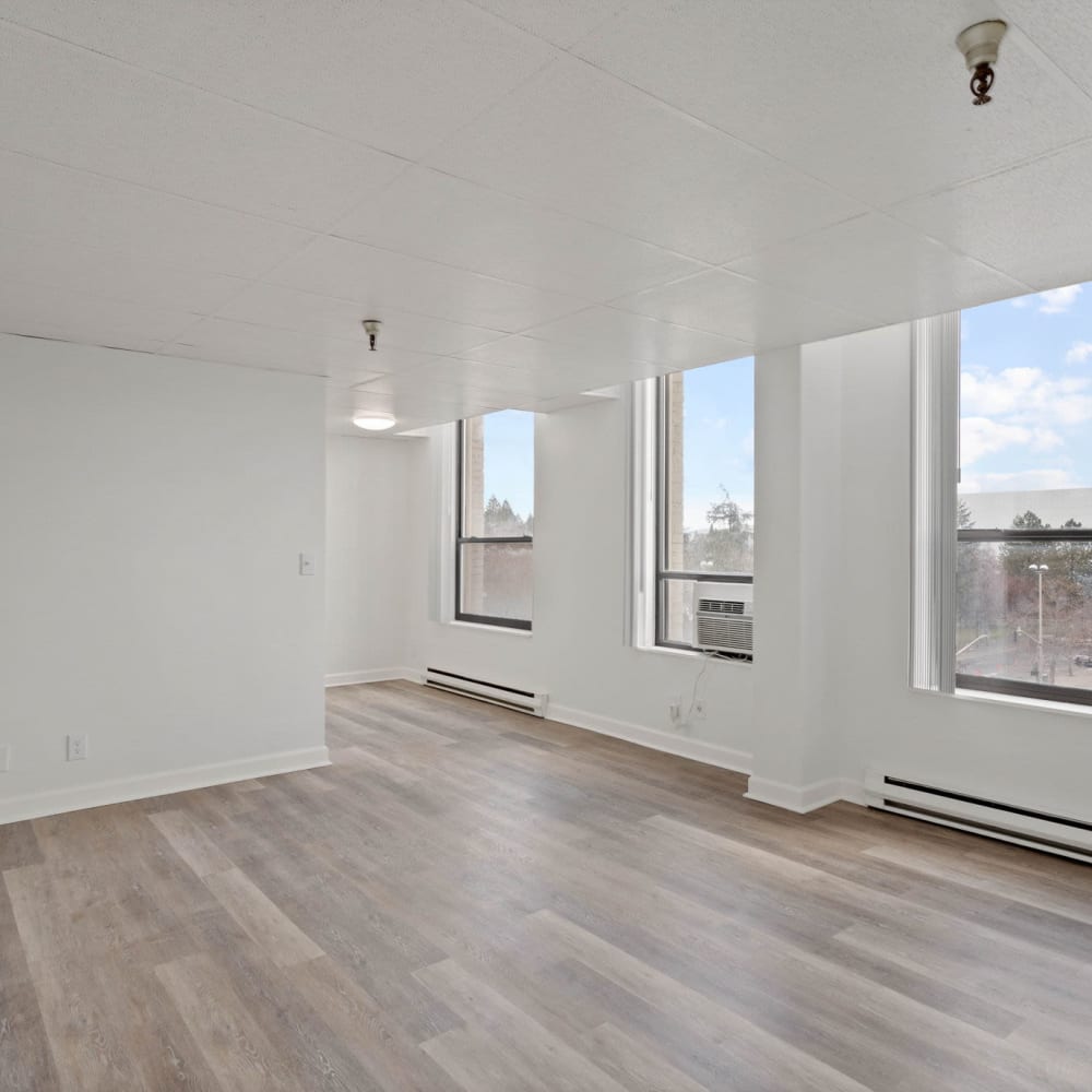 Spacious kitchen with plank flooring at Coeur D'Alene Plaza in Spokane, Washington