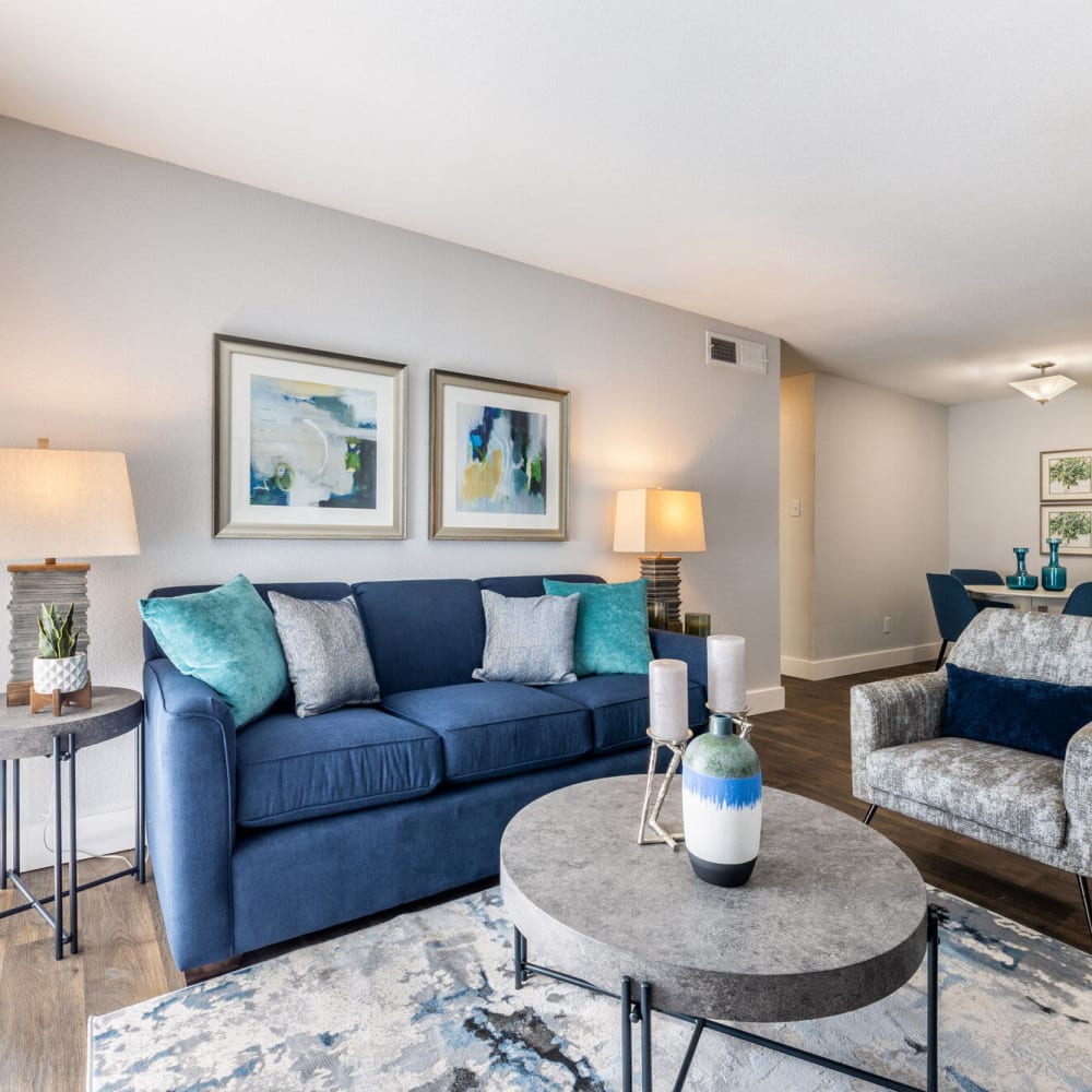 Living space with couch and coffee table at The Gibson in Houston, Texas