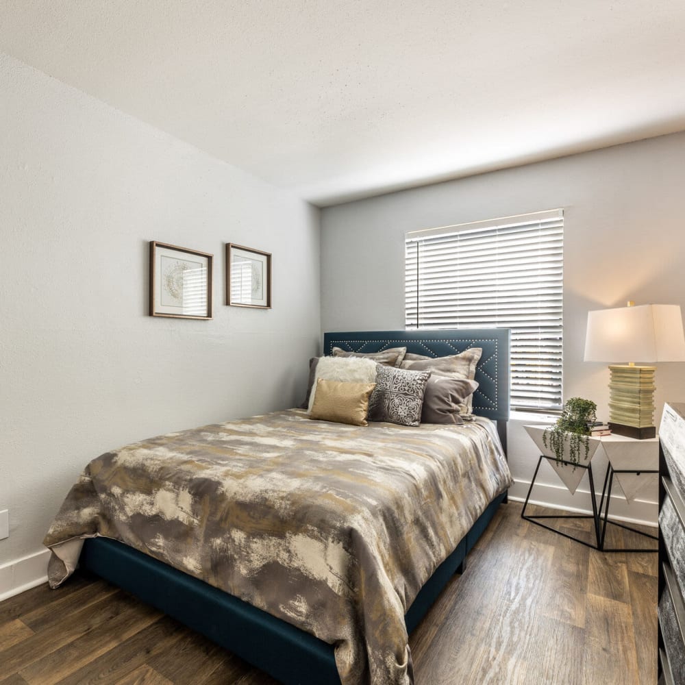 Resident living space with lamp and ample natural light at The Grove in Houston, Texas