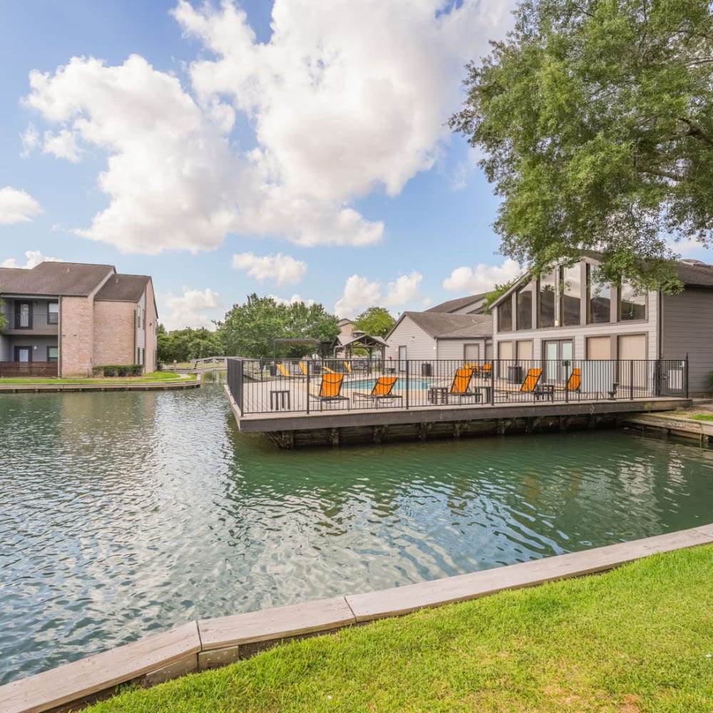 Beautiful view of clubhouse at Lakebridge Apartments in Houston, Texas