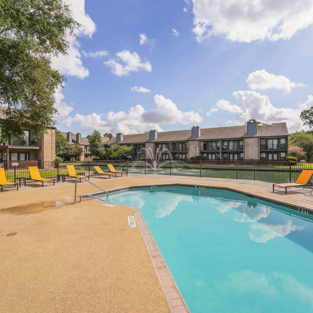 Resident swimming pool at Lakebridge Apartments in Houston, Texas
