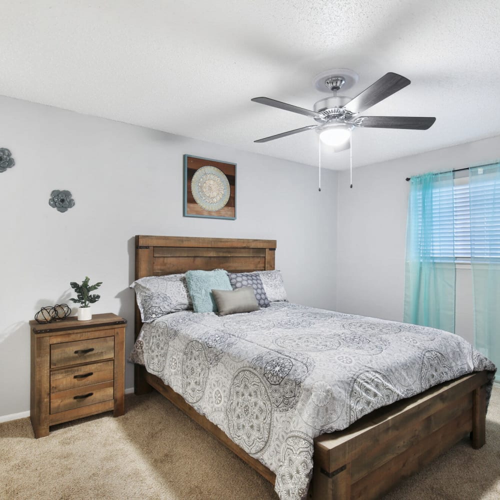 Resident living space with plush carpeting at The District on Collins in Arlington, Texas