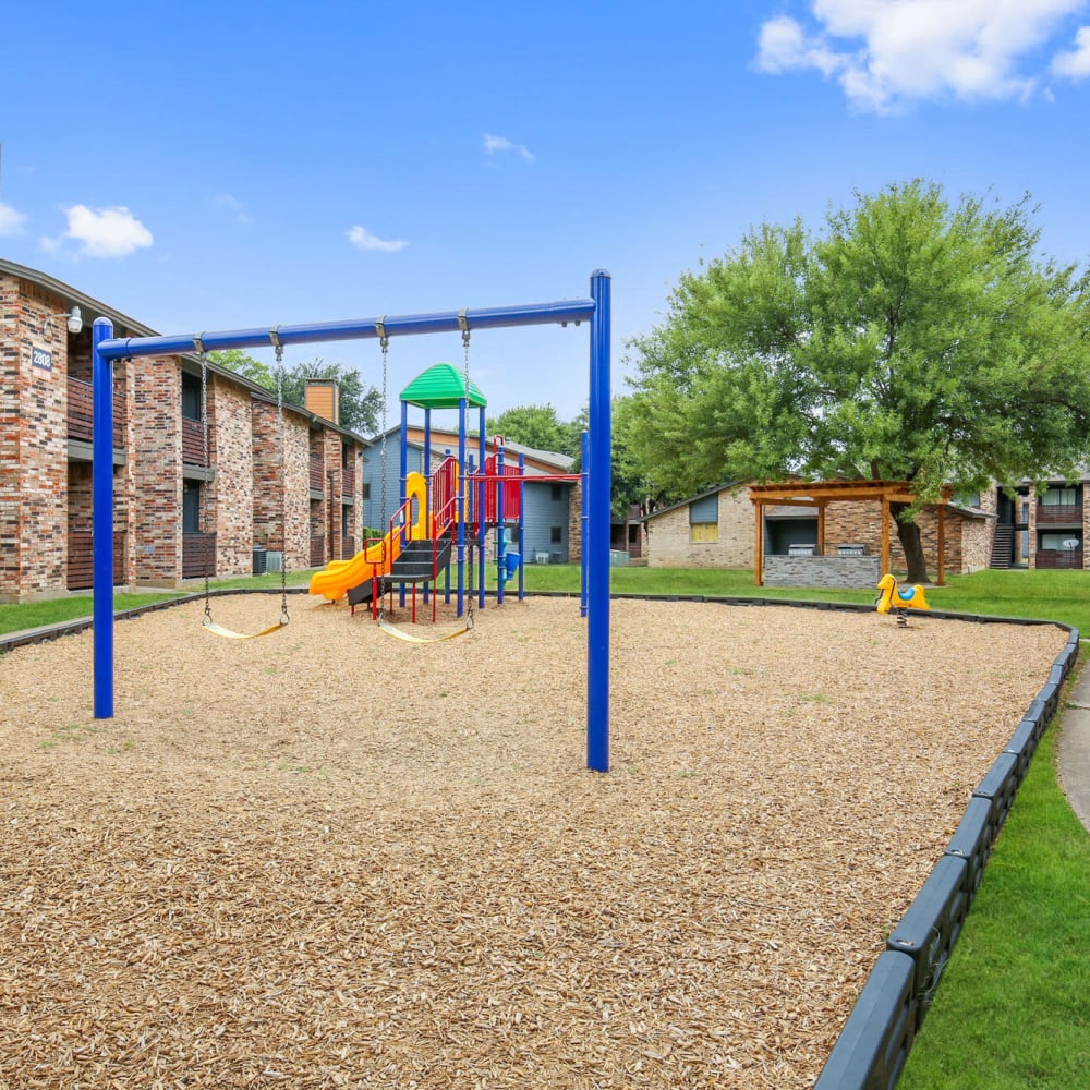 Community playground at The District on Collins in Arlington, Texas