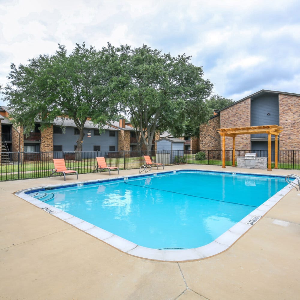Resident swimming pool at The District on Collins in Arlington, Texas