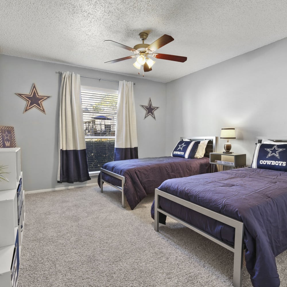 Bedroom with carpeting and two beds at TwentyOne15 in Arlington, Texas
