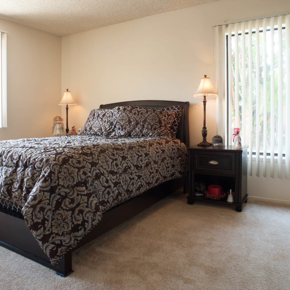 Master bedroom in a unit at The Grove in Ontario, California