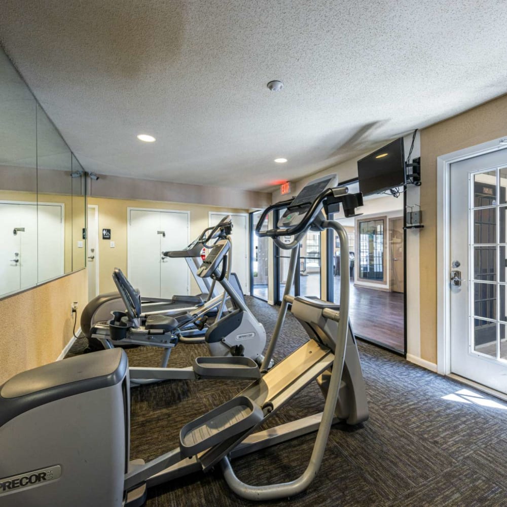 Fitness center with exercise machines at The Landing at Clear Lake in Webster, Texas