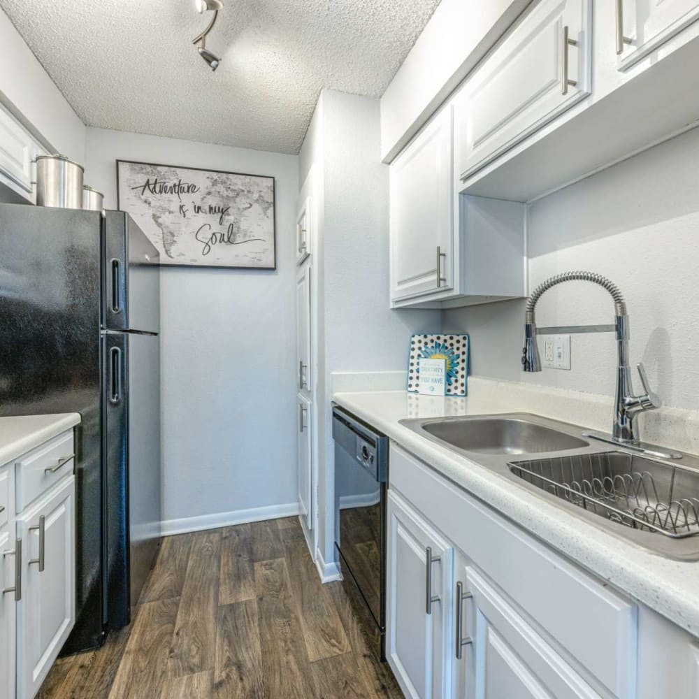 Modern kitchen with ample counter space at The Landing at Clear Lake in Webster, Texas