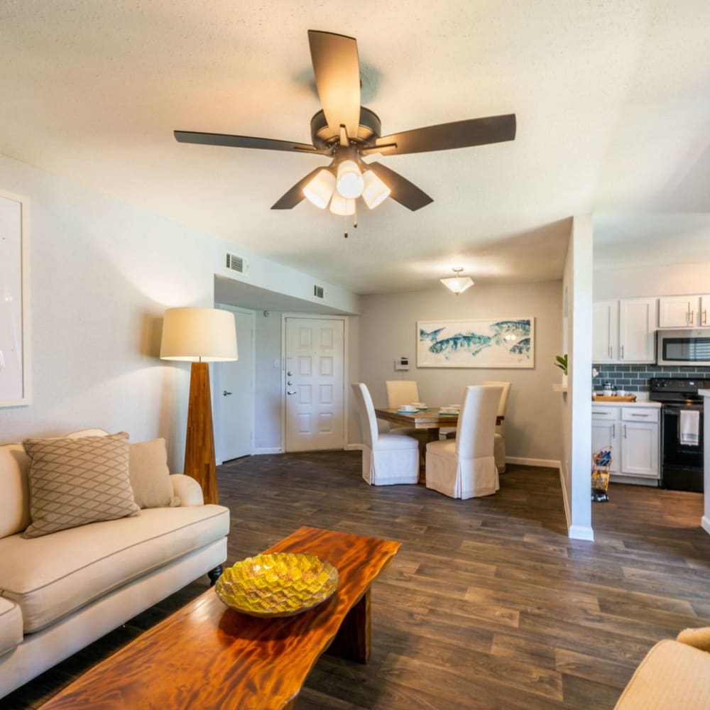 Living space with ceiling fan at Waterside Apartments in Houston, Texas