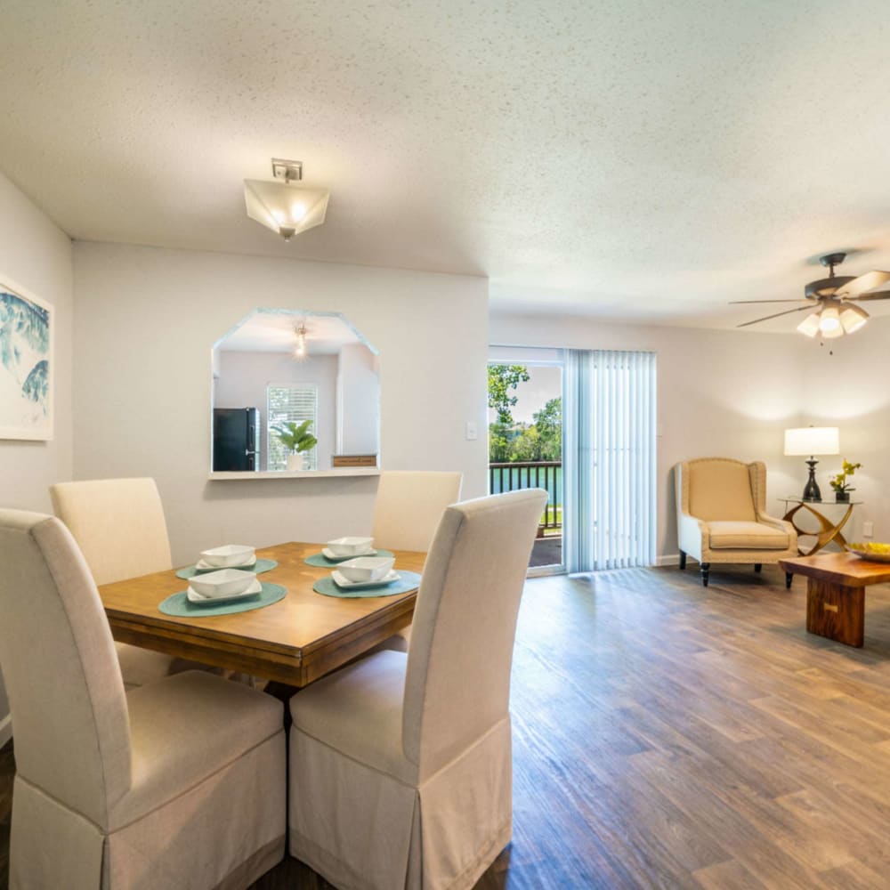 Living space with dinner table and chairs at Waterside Apartments in Houston, Texas
