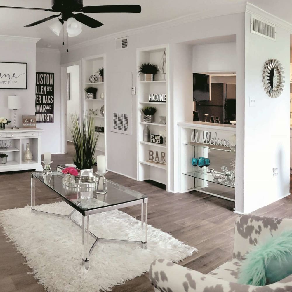 Resident living space with a ceiling fan at Carrara at Cypress Creek in Spring, Texas