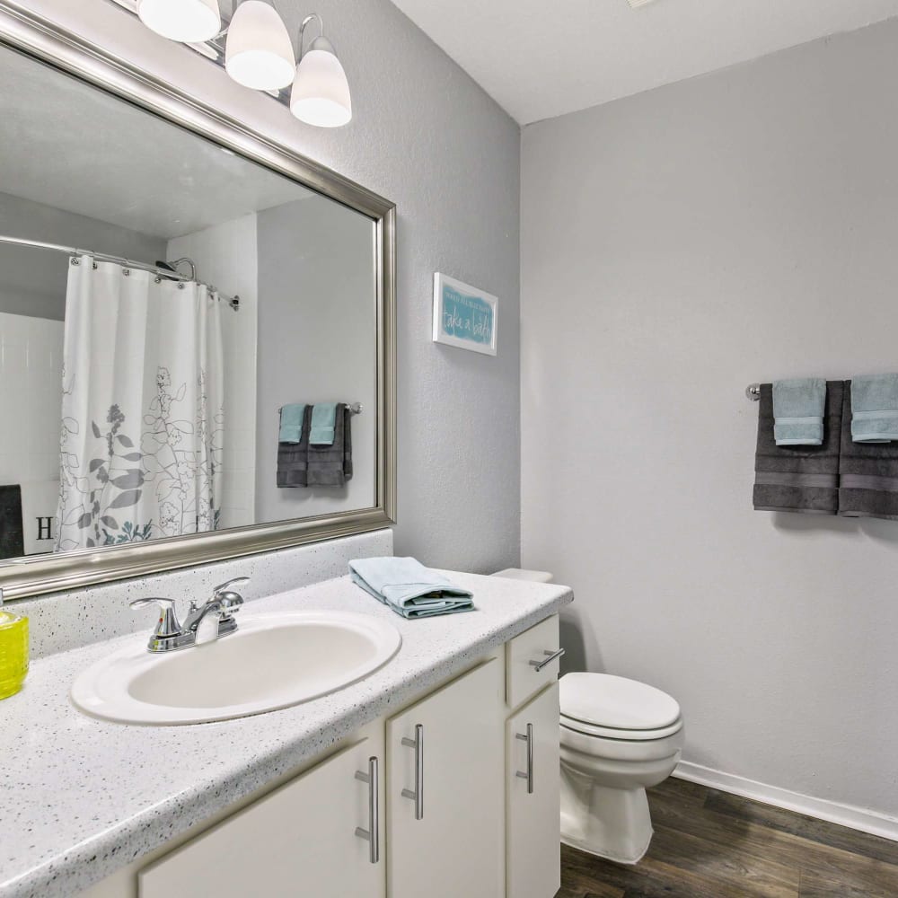 Bathroom with ample lighting and counter space at The Hub at Chisolm Trail in Fort Worth, Texas