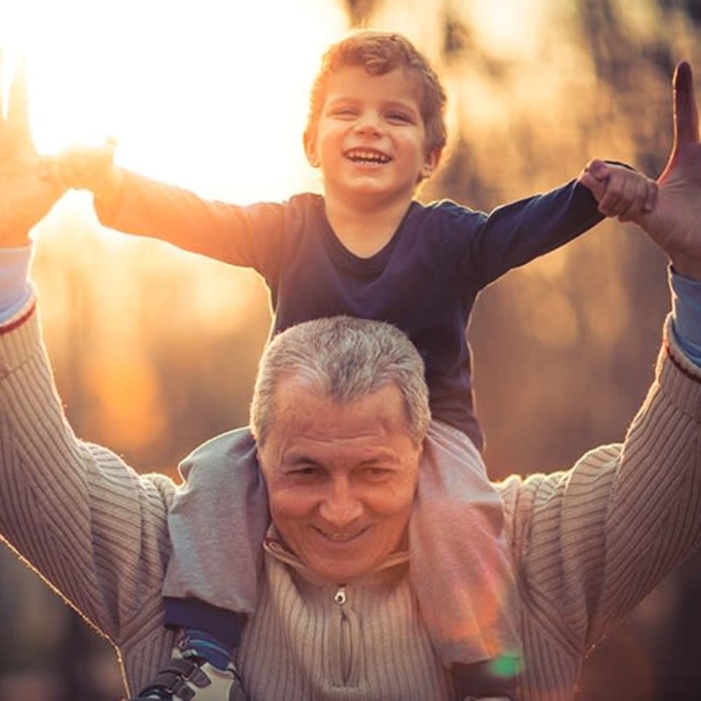 A resident and his grandchildren at The Ridge at Beavercreek in Beavercreek, Ohio