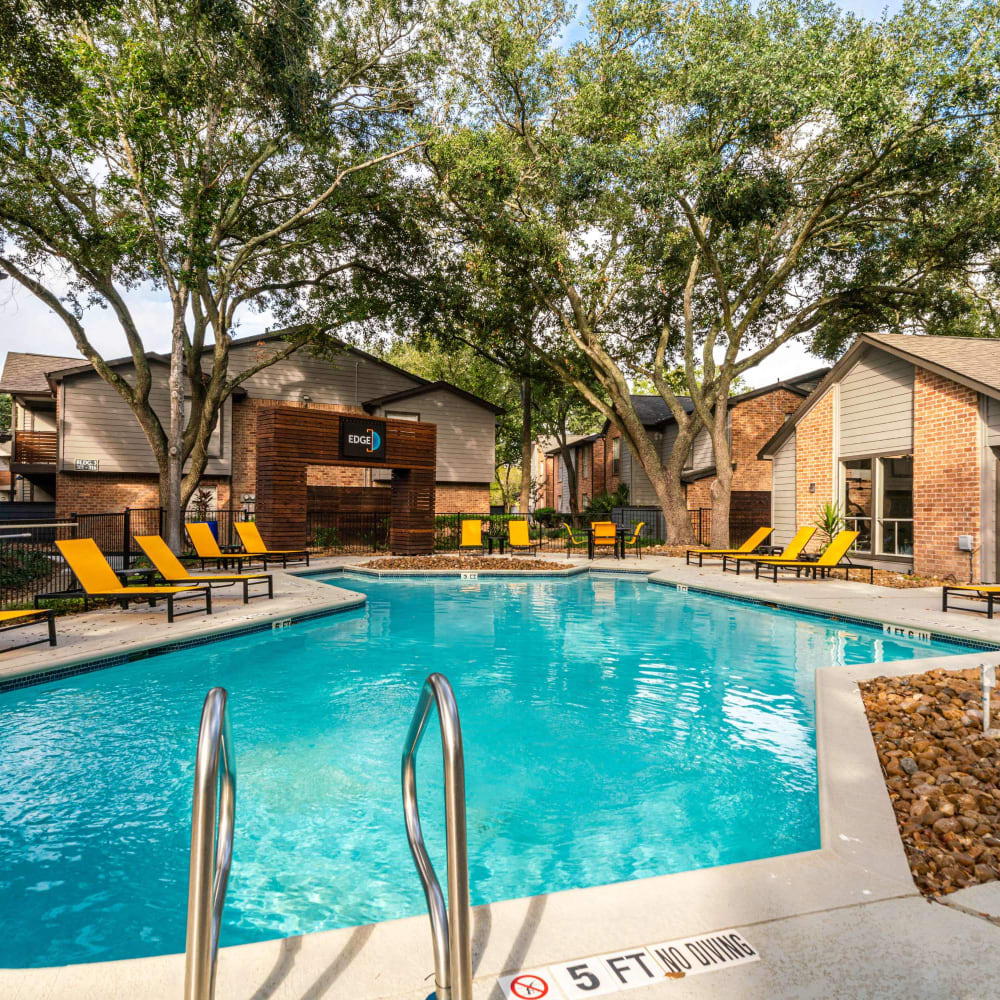 Relax after a long day in this great swimming pool at The Edge at Clear Lake in Webster, Texas