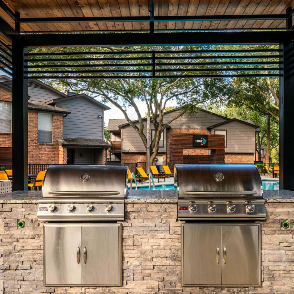 Community covered gas barbeque at The Edge at Clear Lake in Webster, Texas