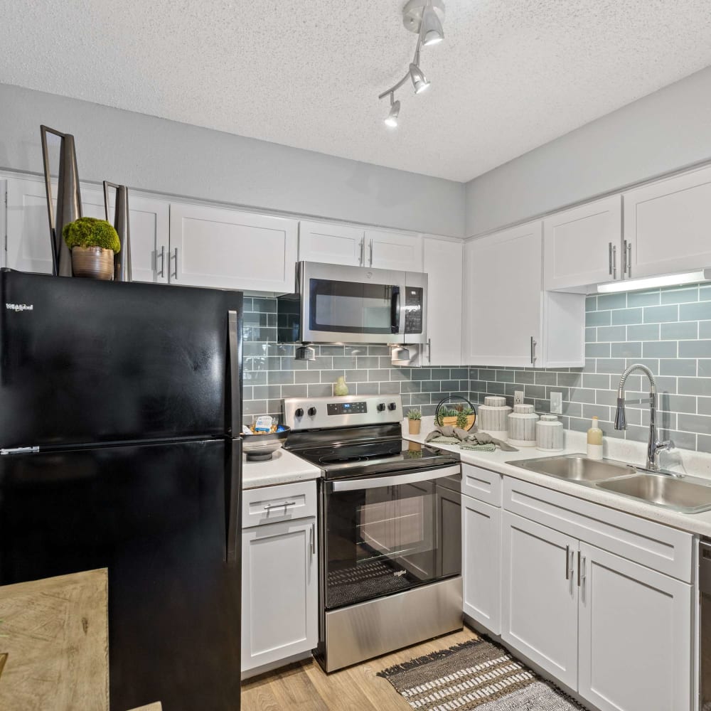 Modern appliances in kitchen at The Hampton on Jupiter in Dallas, Texas