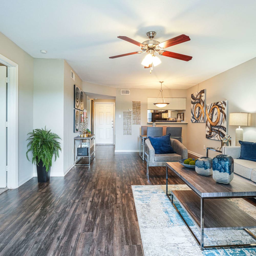 Wood style-flooring with ceiling fan at The Madison on the Lake in Houston, Texas