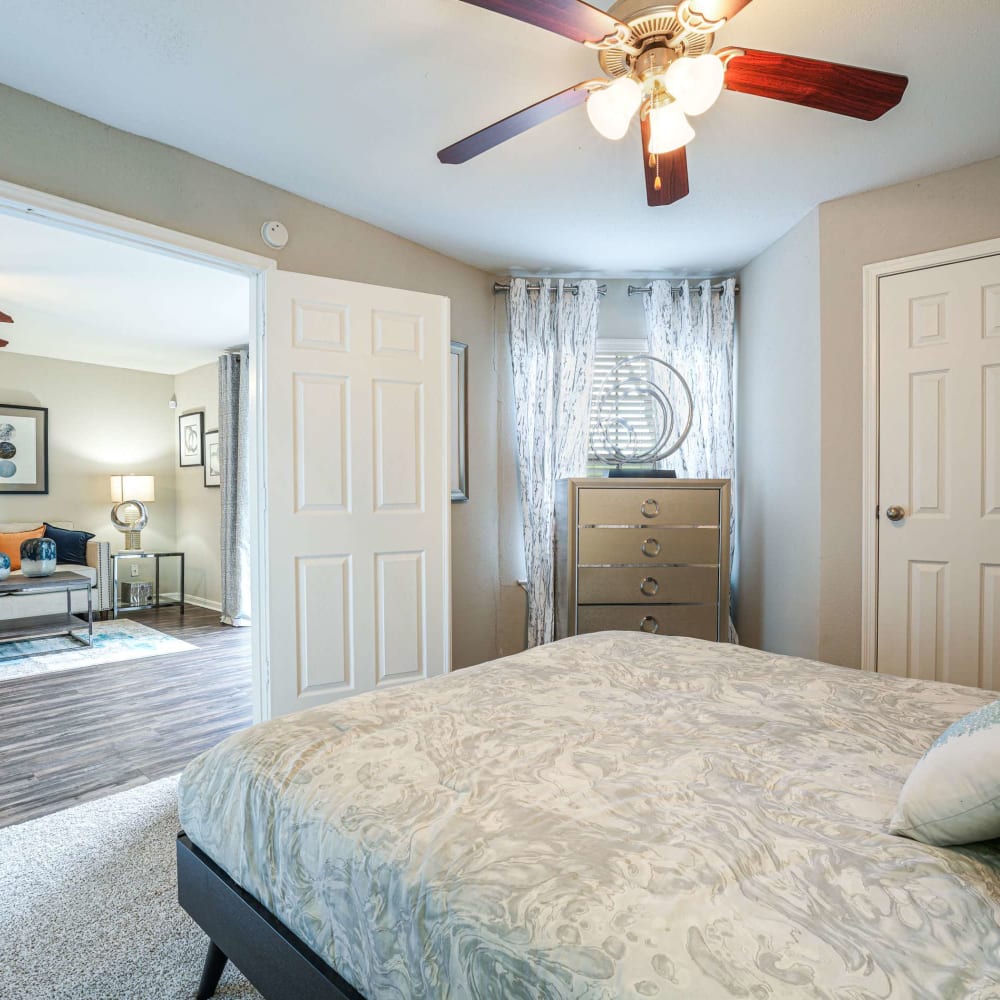 Bedroom with double doors at The Madison on the Lake in Houston, Texas