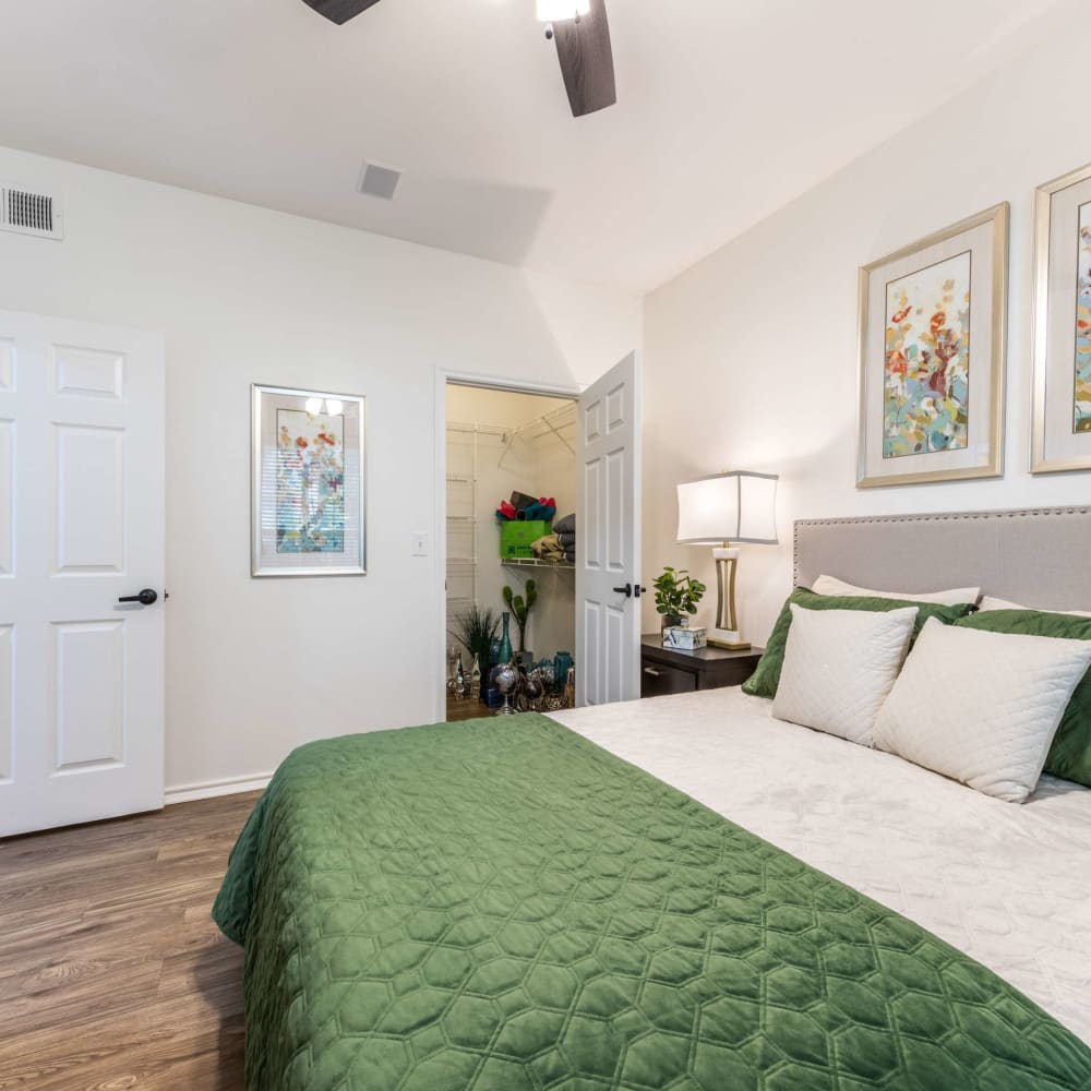Bedroom with wood-style flooring at The Pines on Spring Rain in Spring, Texas