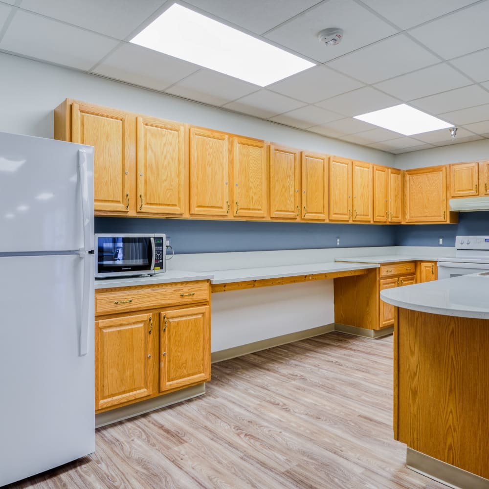 Community kitchen area at Mable H Kehres Apartments in Monroe, Michigan