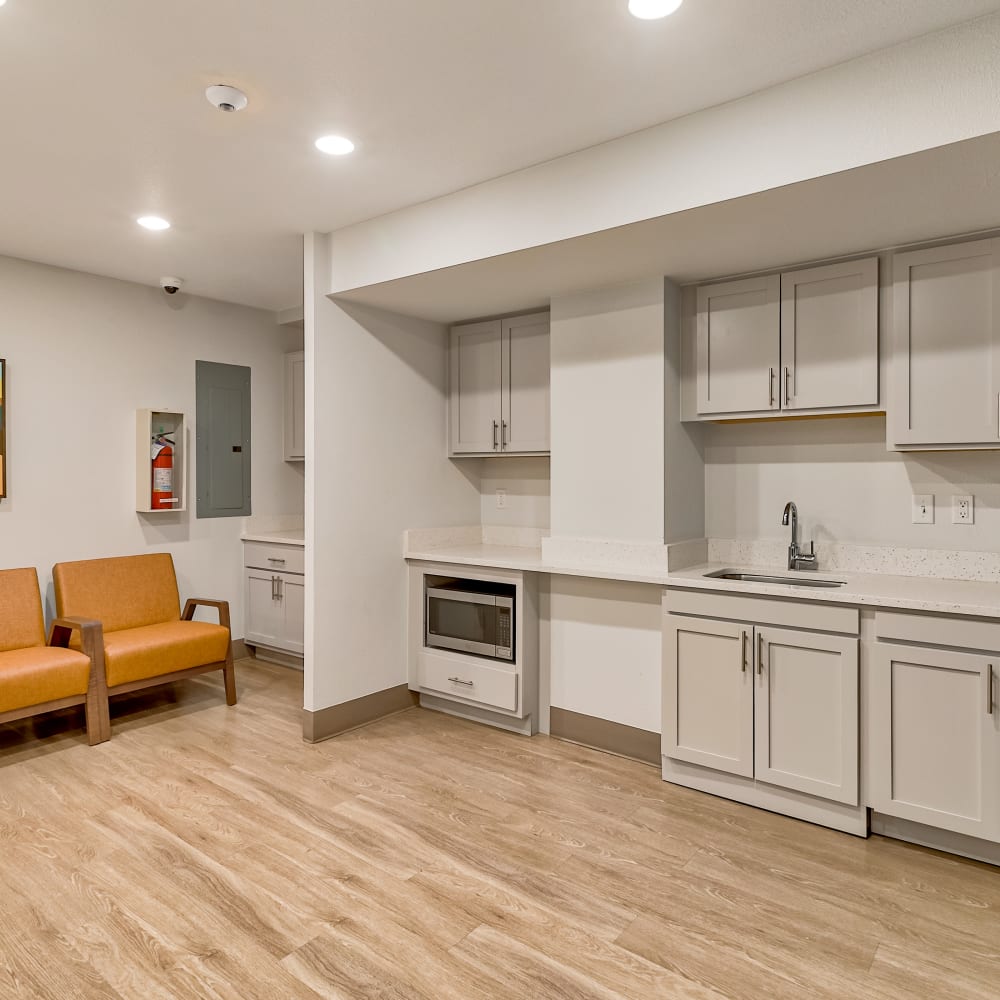 Community kitchen area at Drehmoor Apartments in Denver, Colorado