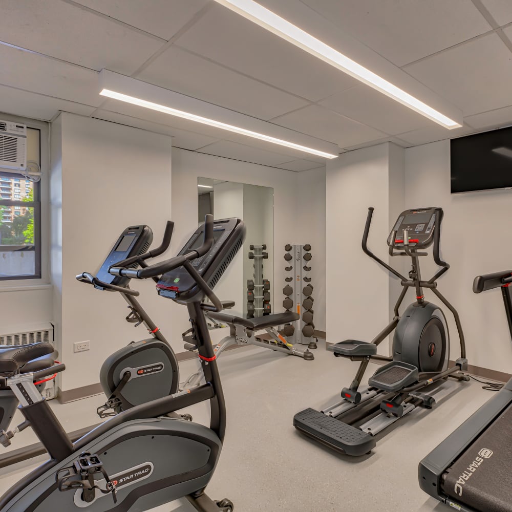 Well-equipped fitness center at Tower West Apartments in New York, New York