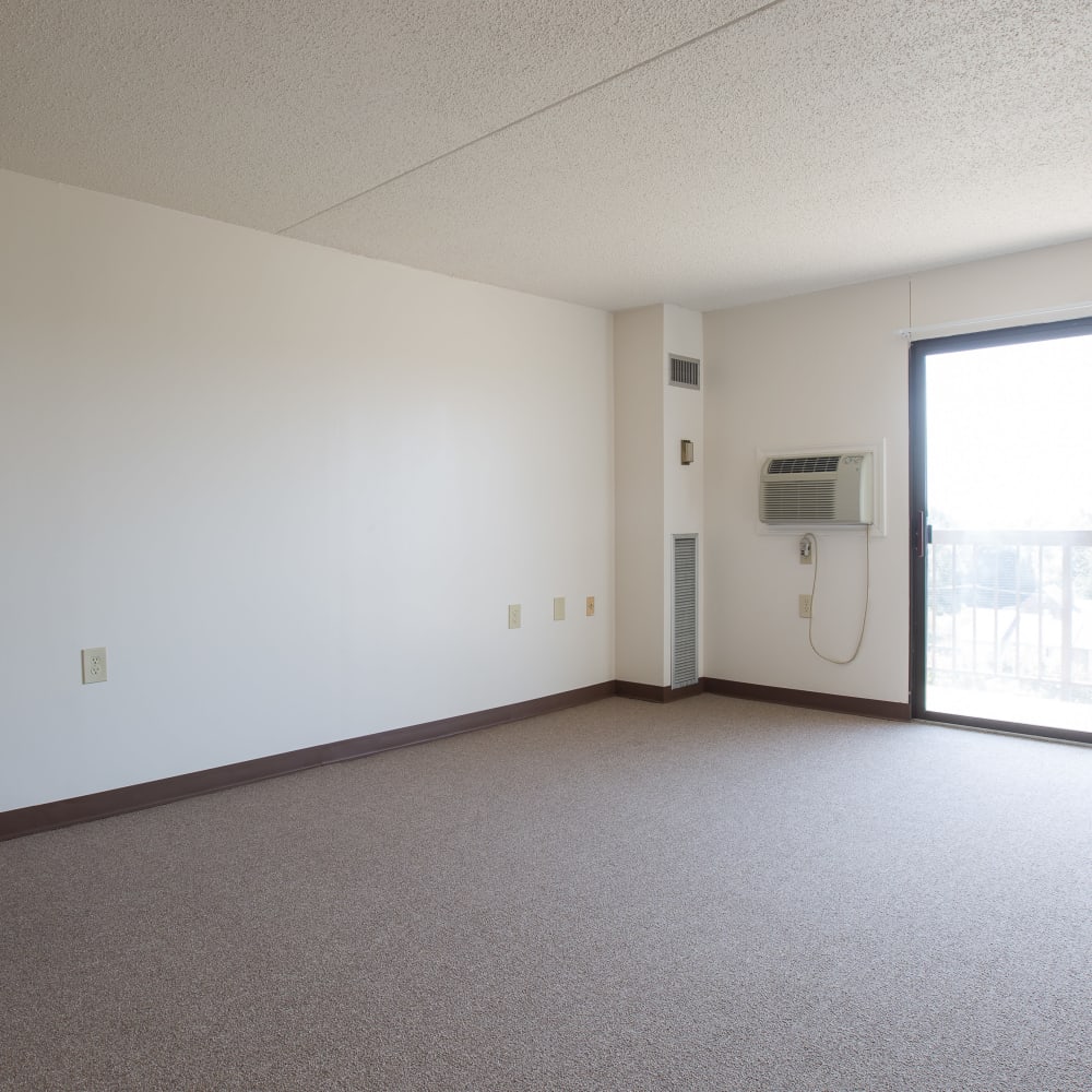Model living space with in-unit AC at Plymouth Square Village in Detroit, Michigan