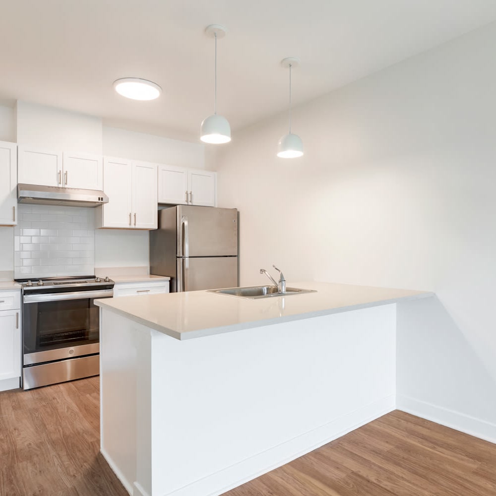 Modern kitchen with tall counters at Metro Green Court in Stamford, Connecticut