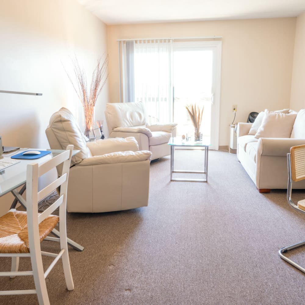 Model living room at Village Square Apartments in Williamsville, New York