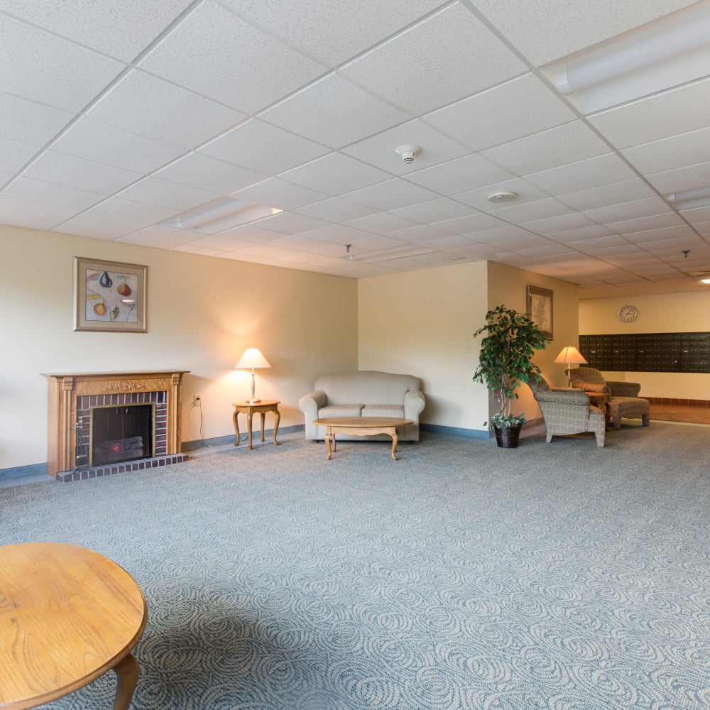 Clubhouse lounge with fireplace at North Port Village in Port Huron, Michigan