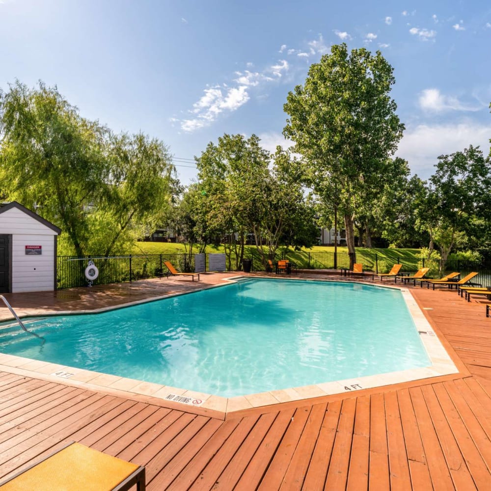 Multiple refreshing swimming pools at The Madison on the Lake in Houston, Texas