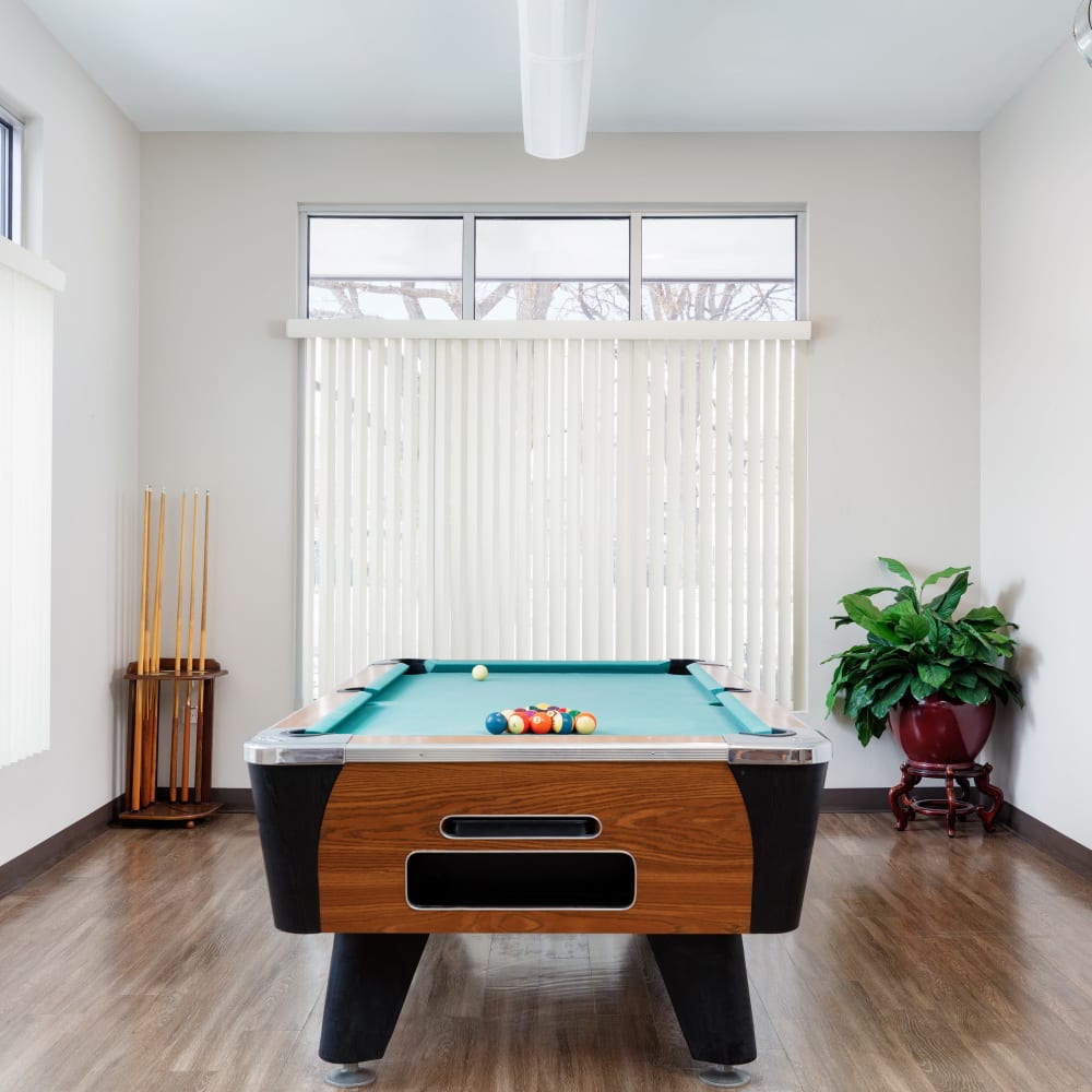 Game room with billiard table at Juanita Nolasco Residences in Denver, Colorado