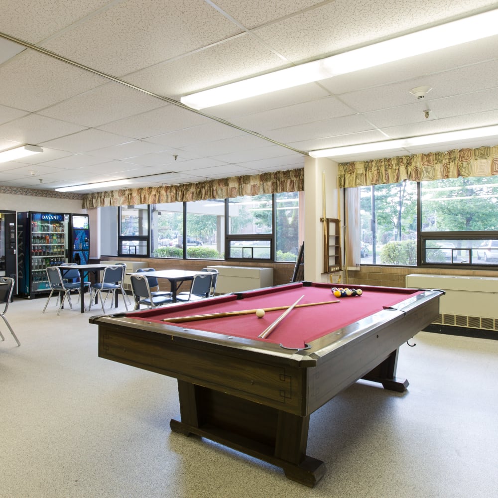 Rec center with a pool table at Ziegler Place in Livonia, Michigan
