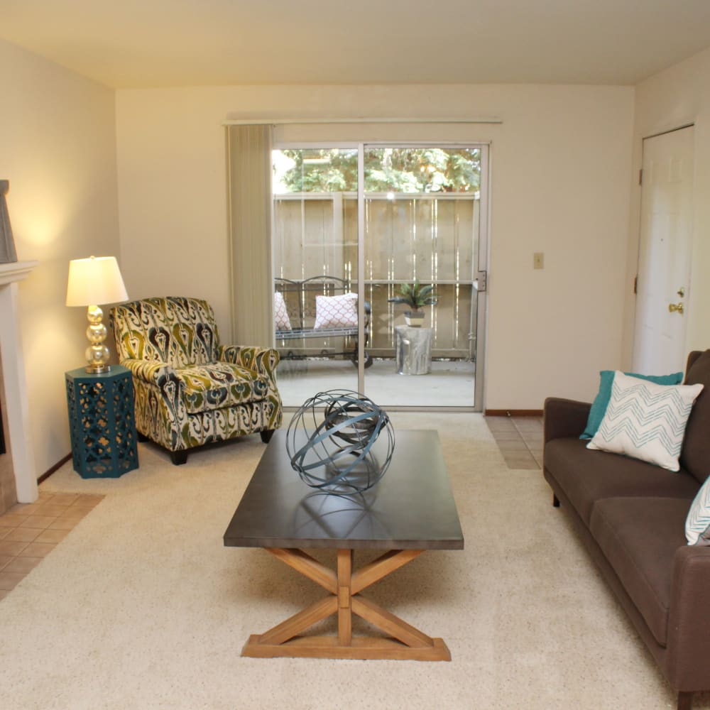 Living room with patio access at Cameron Oaks in Cameron Park, California