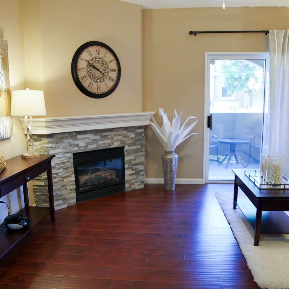 Spacious apartment with a fireplace at Vineyard Gate Apartments in Roseville, California