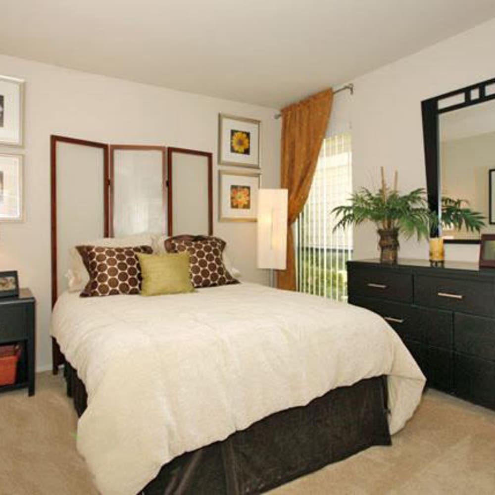 Primary bedroom at Riverstone Apartments in Sacramento, California