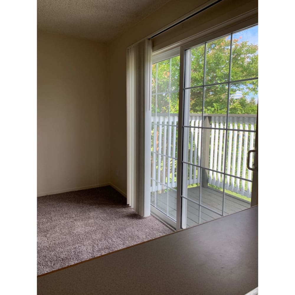 Sliding door to the private balcony at Abbey Pointe Apartments in Stockton, California