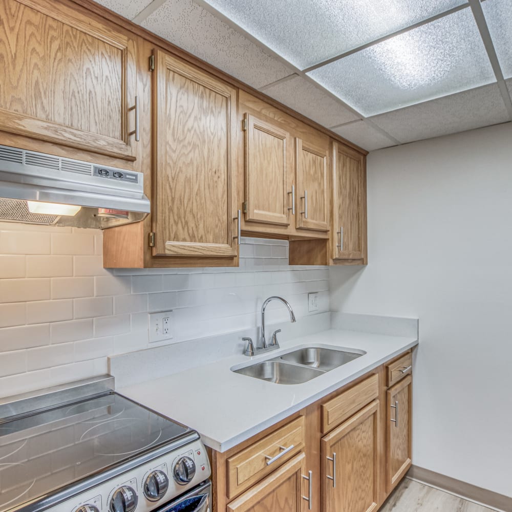 Renovated model kitchen with with stainless appliances Lakeland Place in Waterford, Michigan