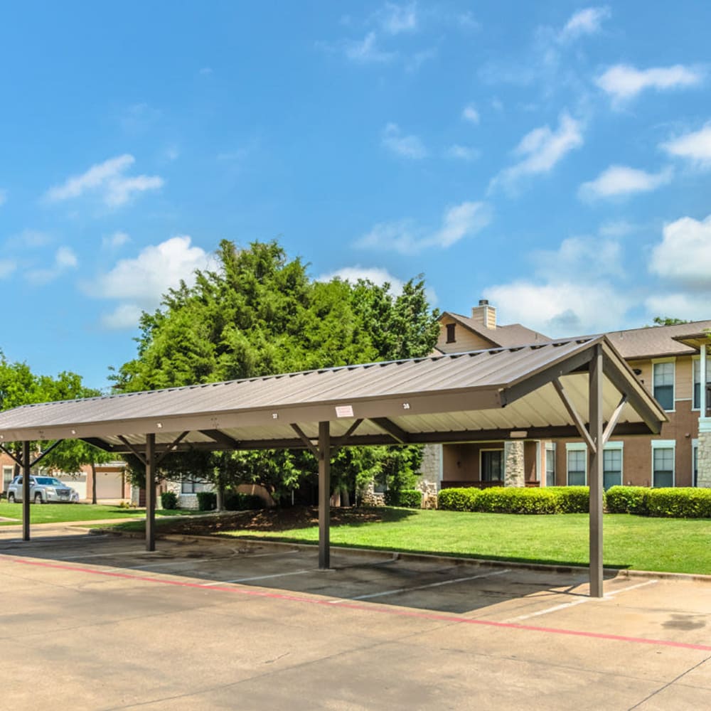 Covered parking spaces at Mission Ranch in Mesquite, Texas