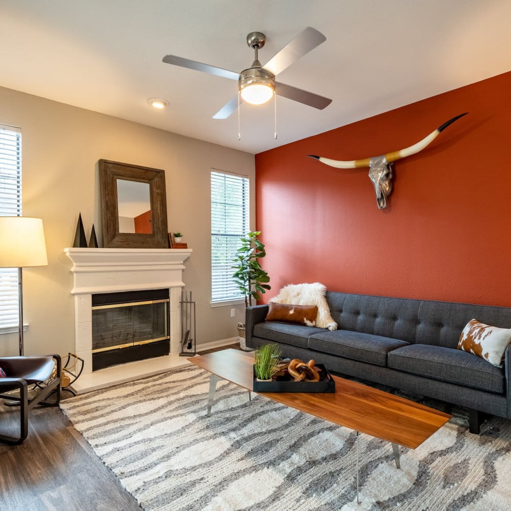 Resident living space with a fireplace at Mission Ranch in Mesquite, Texas